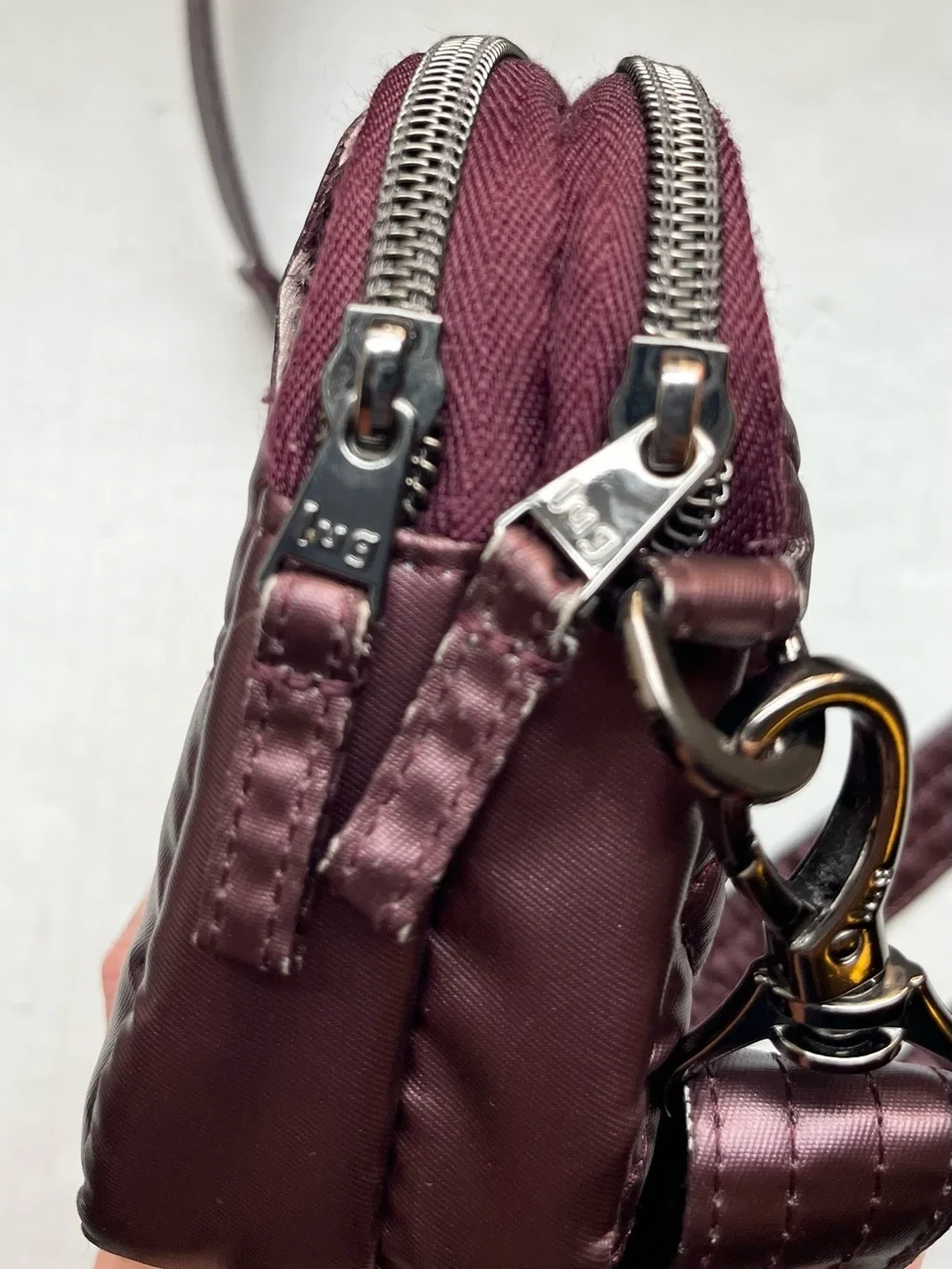 Lug Coupe Convertible Crossbody Bag with Basketweave Pattern in Purple/Plum.